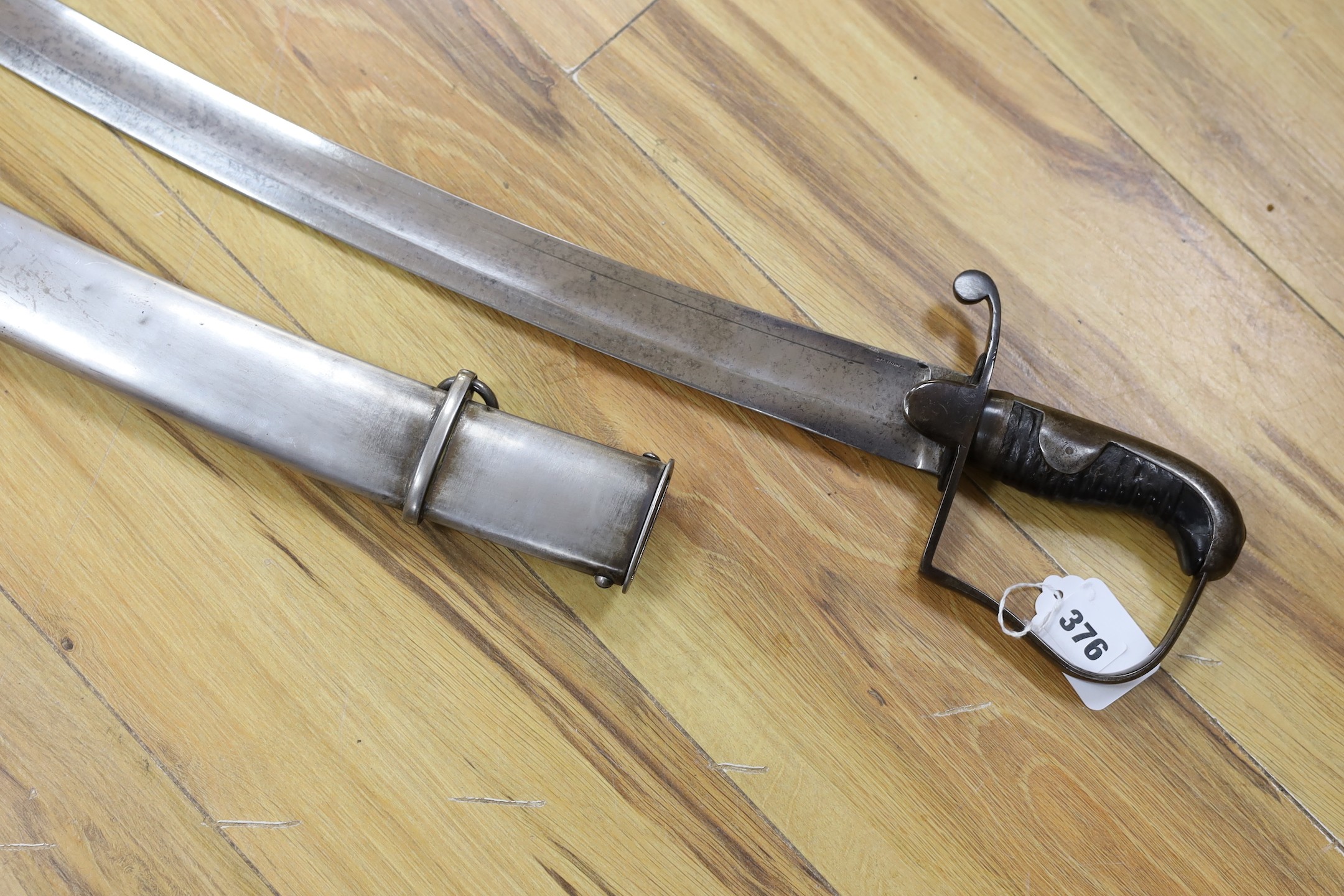 A British pattern 1796 light cavalry sabre, ‘W.S.R.’ engraved to hilt and ‘Bats’? to spine, with steel scabbard. 99cm total length